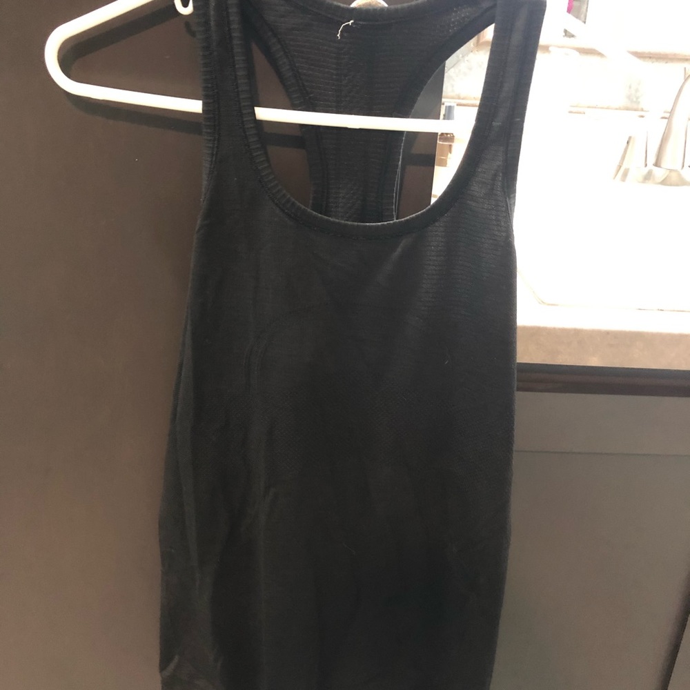 Black swiftly tech Racerback size 6